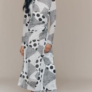 By Anthropologie Black and White Asymmetrical long sleeve mesh mid Dress